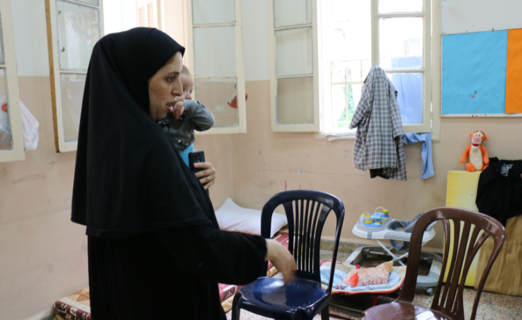 Dania* and her family are living at Basta Middle School, a temporary shelter. Dania’s family has been forced to relocate three times. © UNFPA Lebanon/Anastacia Hajj