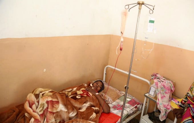 A patient with emergency obstetric complications receives a life-saving blood transfusion at El Fasher Maternity Hospital. 