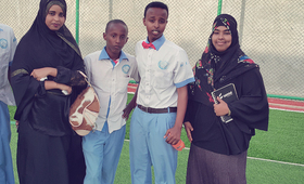 Fatima Abdi Ali (right) with other young people. Ms. Abdi Ali, 21, serves on the country's Youth Advisory Panel, promoting the role of young people in establishing a sustainable peace in Somalia. © Y-Peer Somalia