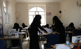 Women make face masks in a safe space in Yemen. © UNFPA Yemen