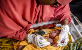UNFPA trained midwife monitoring a newborn at Banadir Hospital, Mogadishu, Somalia