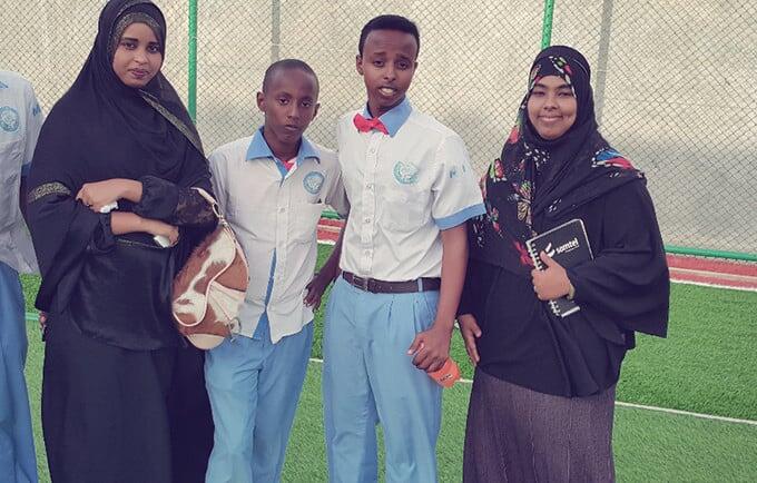 Fatima Abdi Ali (right) with other young people. Ms. Abdi Ali, 21, serves on the country's Youth Advisory Panel, promoting the role of young people in establishing a sustainable peace in Somalia. © Y-Peer Somalia