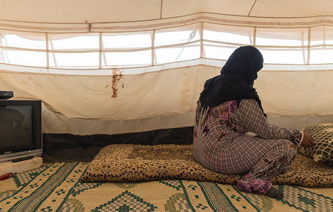 Jannah* refuses to marry off her 14-year-old daughter, despite pressure from relatives. “I will die before I give my daughter away,” she said. © UNFPA/David Brunetti