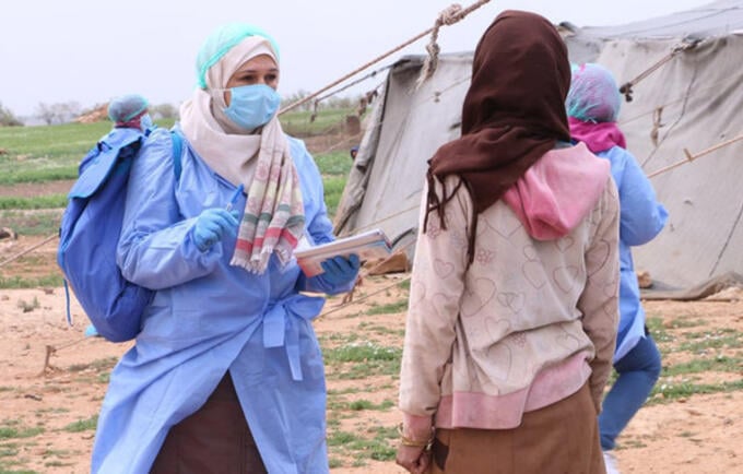 Outreach workers in Syria are raising awareness about the pandemic. © UNFPA Syria